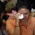 Pesawat Air Asia Ditemukan, Keluarga Histeris