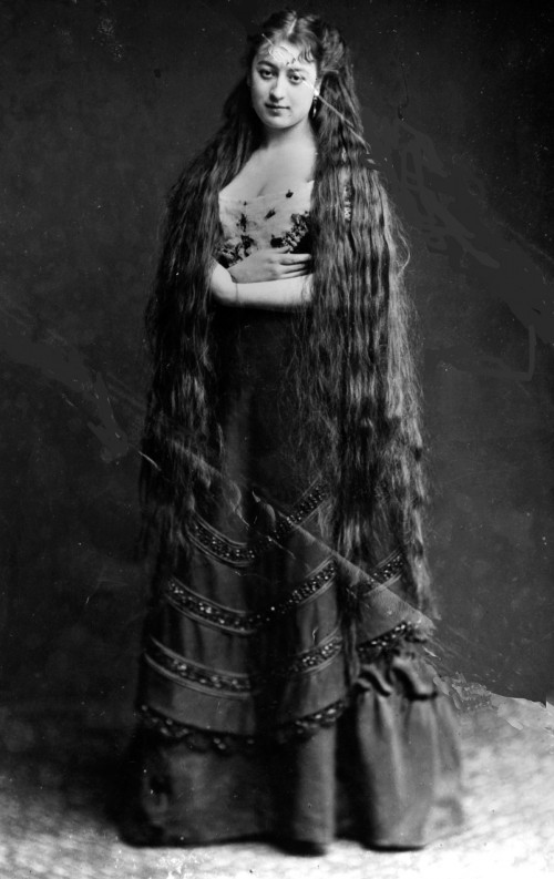 circa 1890:  Mrs Frampton proudly displays her very long hair.  (Photo by Hulton Archive/Getty Images)