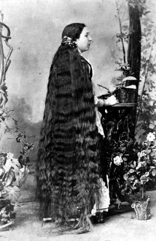 circa 1890:  A lady with hair to her feet.  (Photo by Hulton Archive/Getty Images)