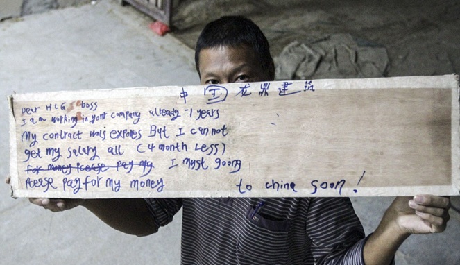 Pria China yang meminta gajinya dibayarkan agar bisa pulang [Image Source]