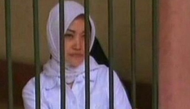 Nurmayani Salam di balik jeruji penjara [Image Source]