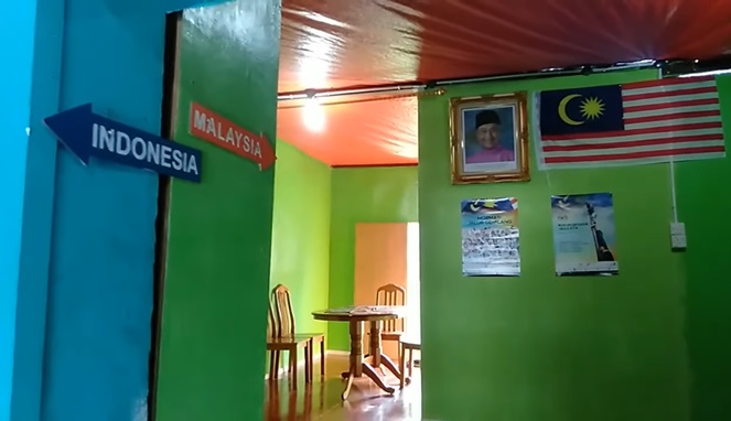 Rumah perbatasan Indonesia dengan Malaysia di Pulau Sebatik, Kabupaten Nunukan, Kalimantan Utara. [Sumber Gambar]